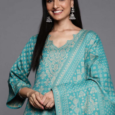 Green and beige woven design dress material