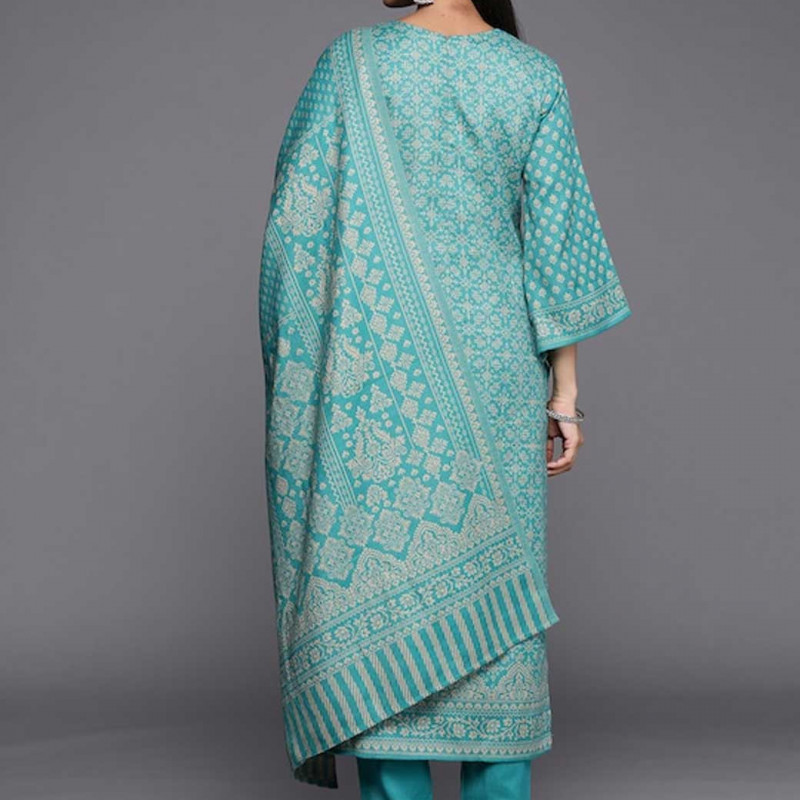 Green and beige woven design dress material